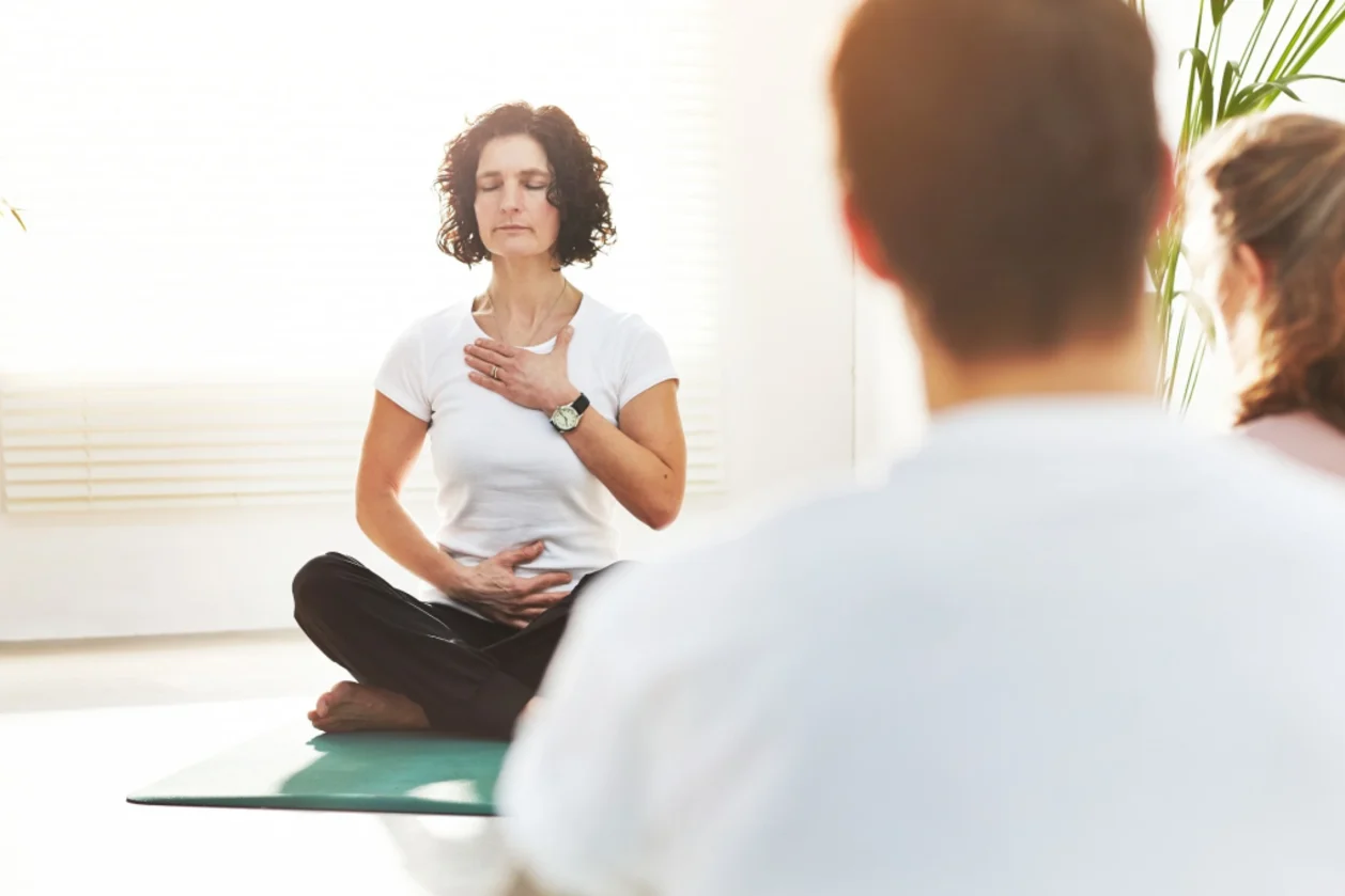 breathwork instructor at retreat teaching vagus nerve exercises